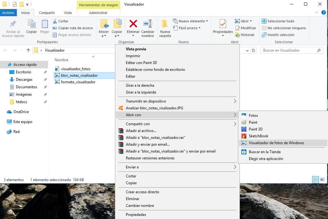 Pulsa botón derecho y luego abrir con y selecciona el Visualizador de Fotos